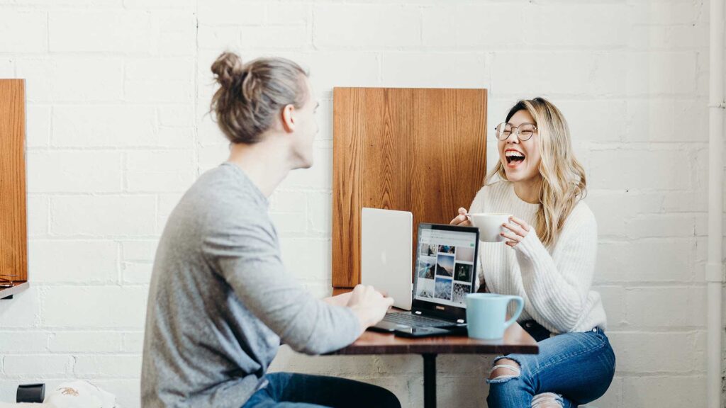 Image of a man and woman talking about local SEO.